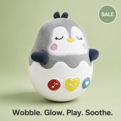 Snoozy Penguin™ – Musical Wobbler
